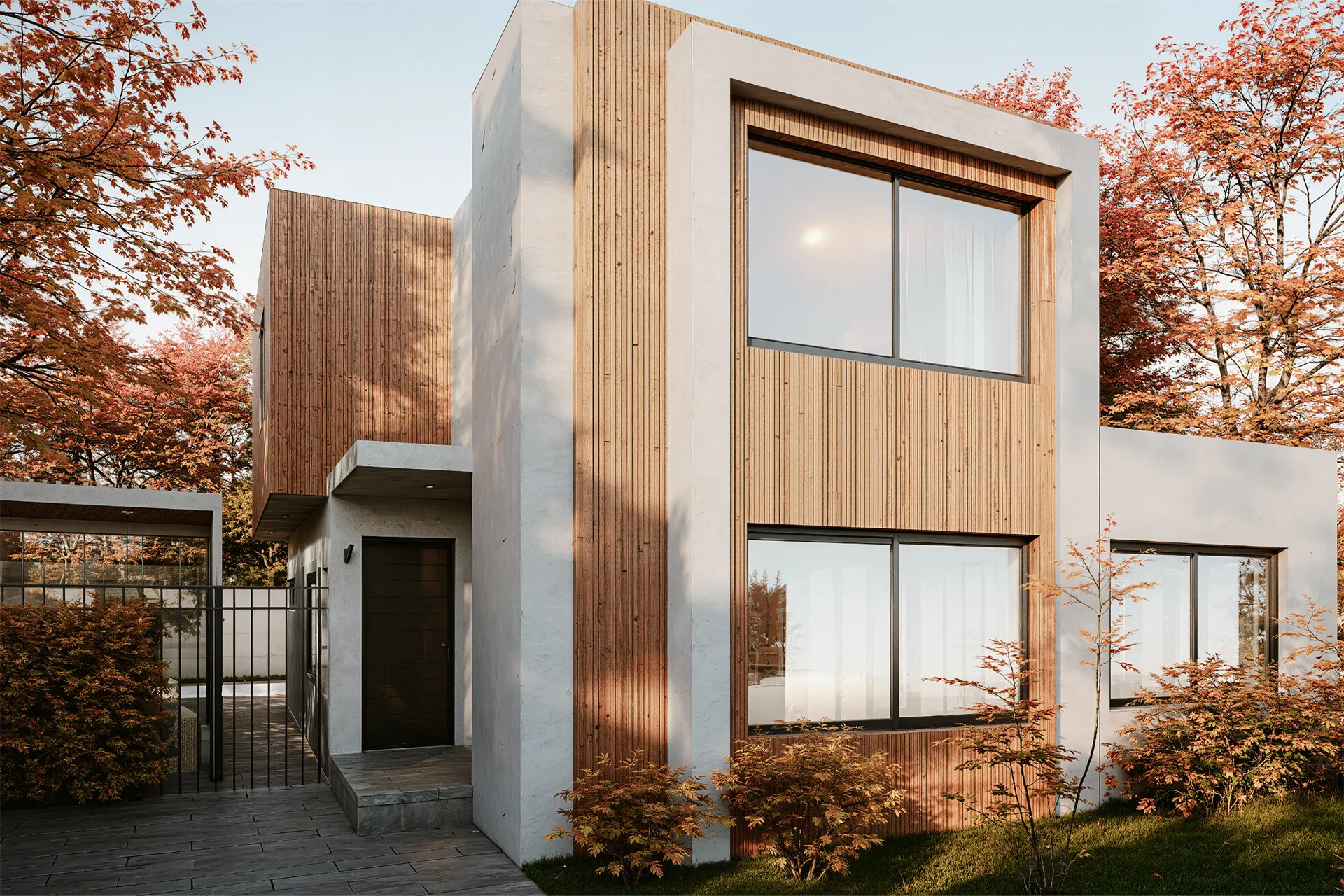 Fachada de dos pisos con revestimiento de madera y hormigón, Casa Trieste