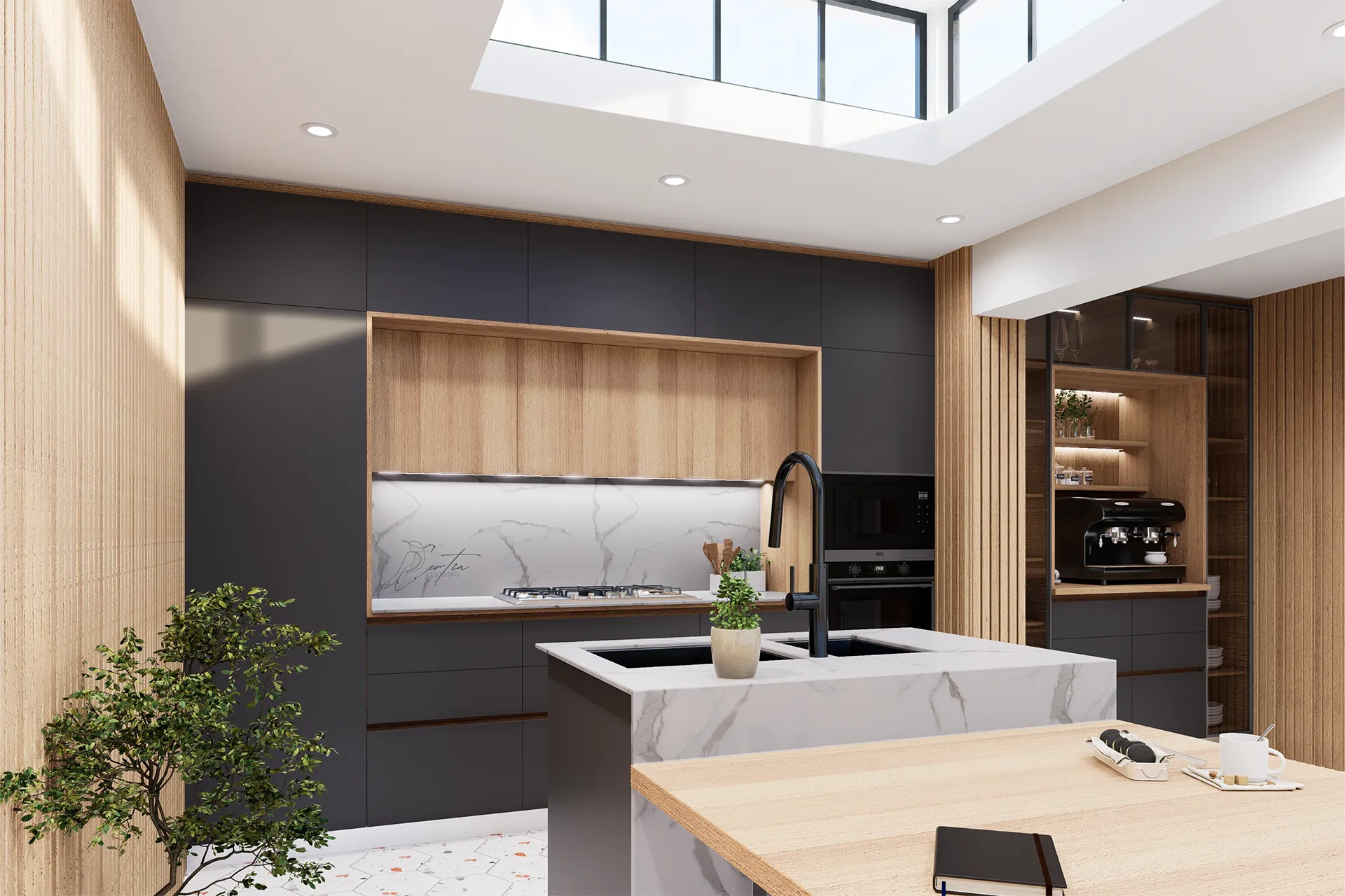 Cocina con isla de mármol, muebles grafito y lucernario, Cocina Alejandro Valdés