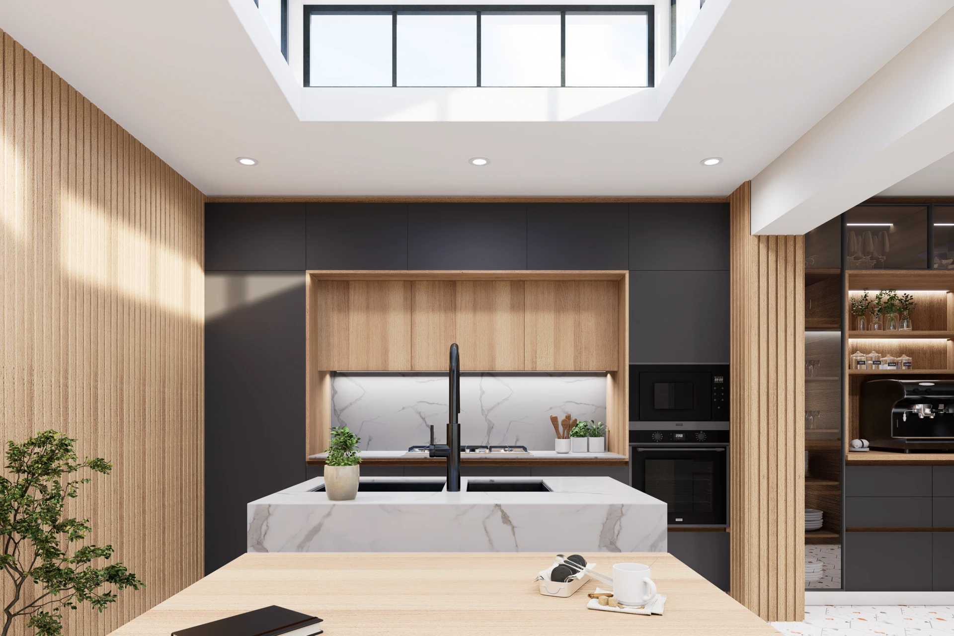 Cocina con lucernario y barra de madera junto a la isla, Cocina Alejandro Valdés